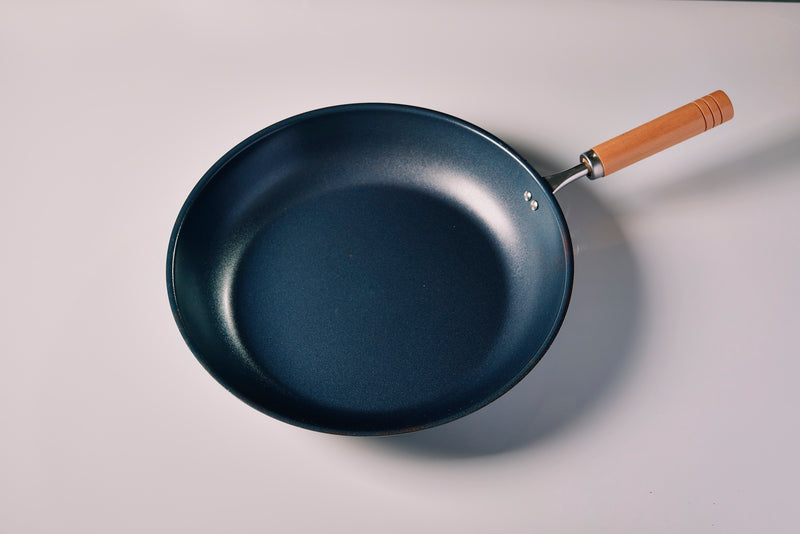 Nano-embossed iron pan