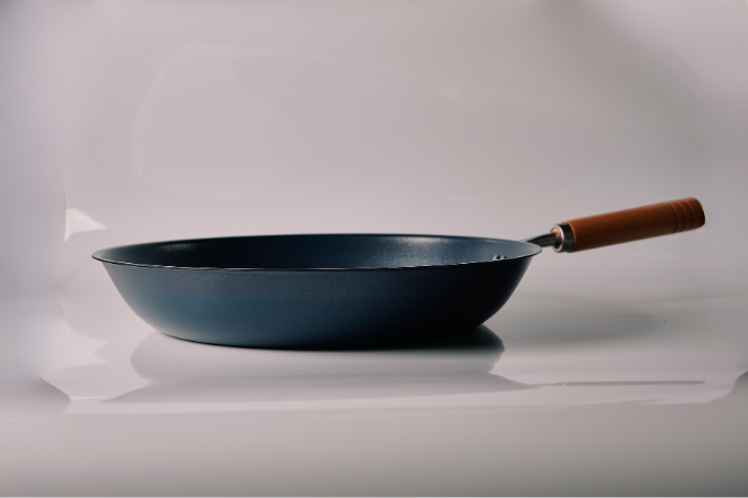 Nano-embossed iron pan